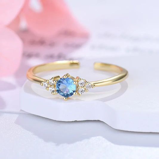 Bague au saphir bleu et zircon